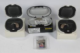 Four Hearing Aids to include Two Oticon Engage Hearing Aids, A Oticon Real 2 Minirite R and A Rexton