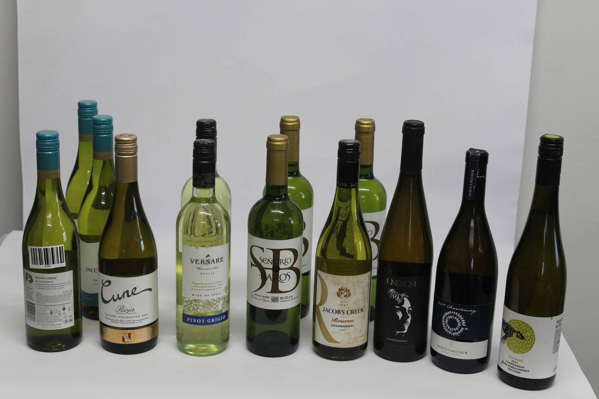 Eight Assorted Chardonnay White Wines to include Jacobs Creek Classic 2022, A Lois Lageder 2019, One