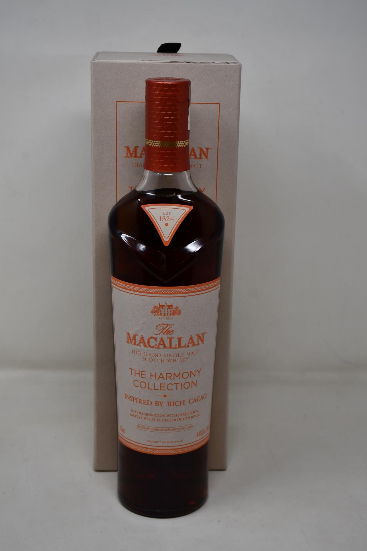 A bottle of The Macallan (The Harmany Collection Rich Cacao) Highland Single Malt Scotch Whiskey (75