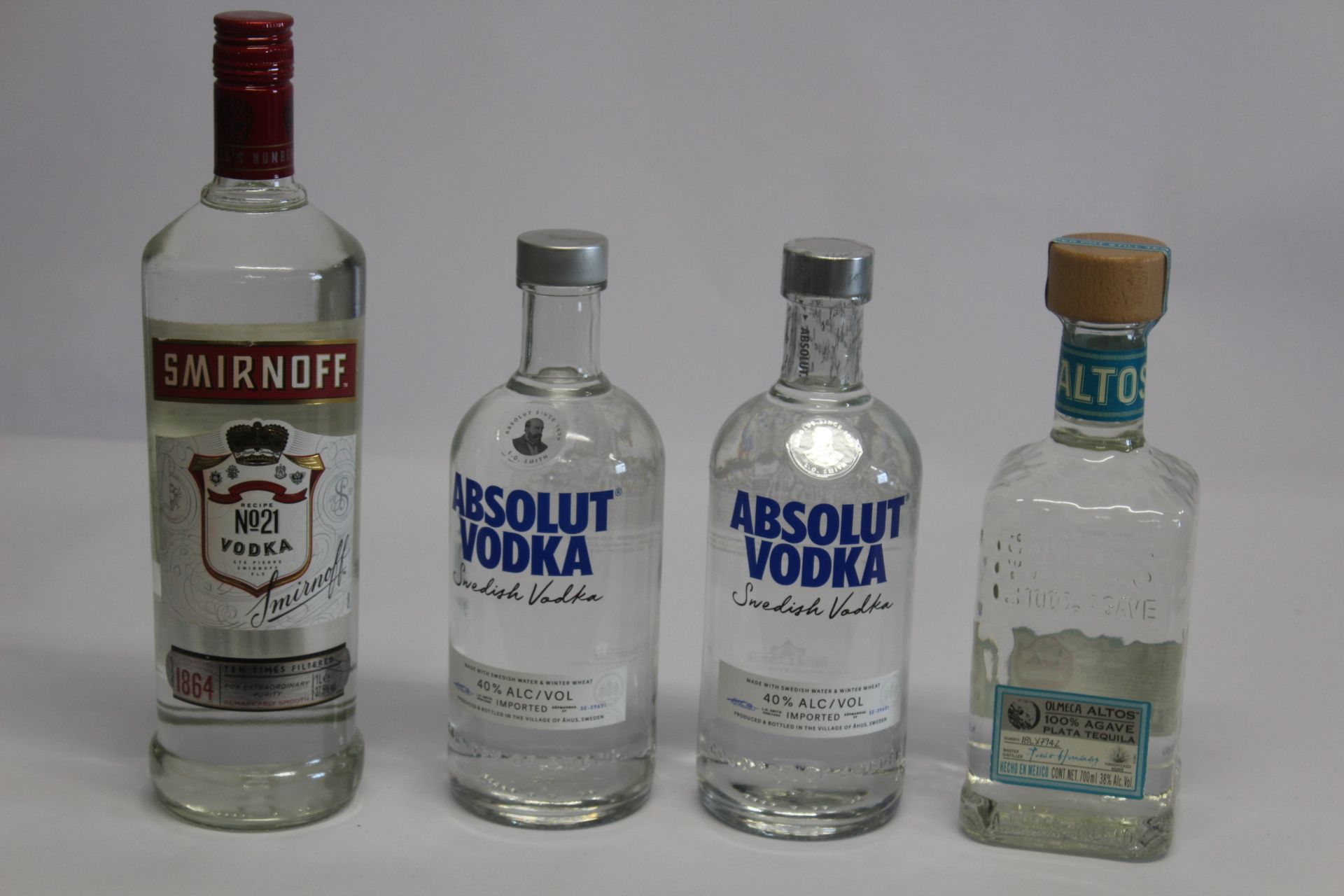 Two Absolut Vodka 2 x 700ml, Smirnoff No21 Vodka 1ltr, Altos 100% Agave Tequila 700ml.