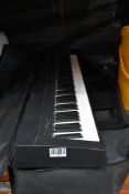 A Pre-owned Yamaha P45 B Digital Piano with Some Accessories and a Travel Bag. Item is Untested, Vie
