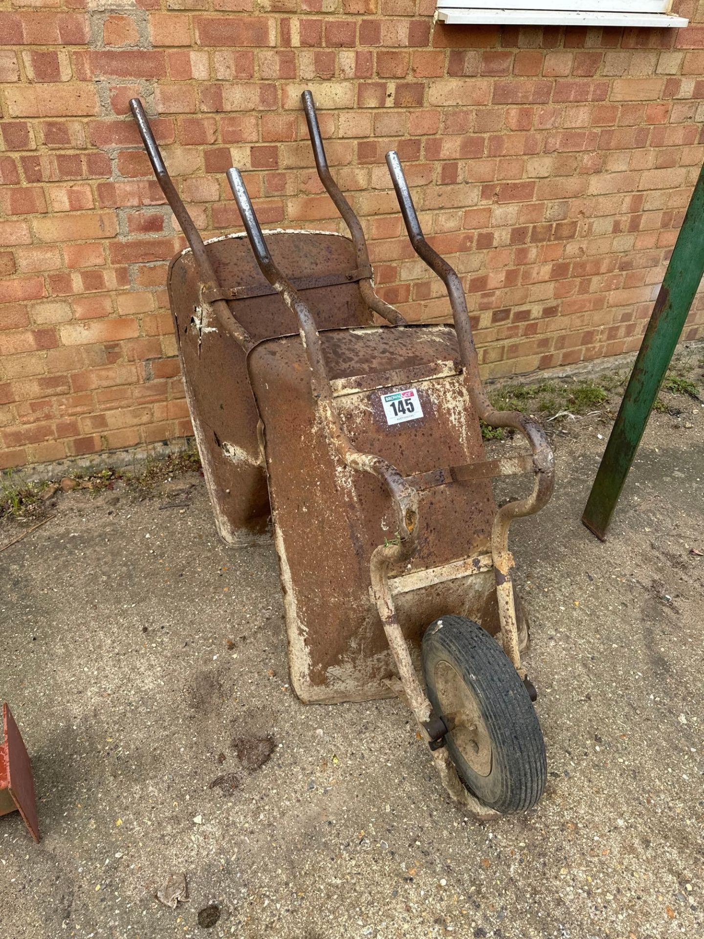 2No metal wheelbarrows