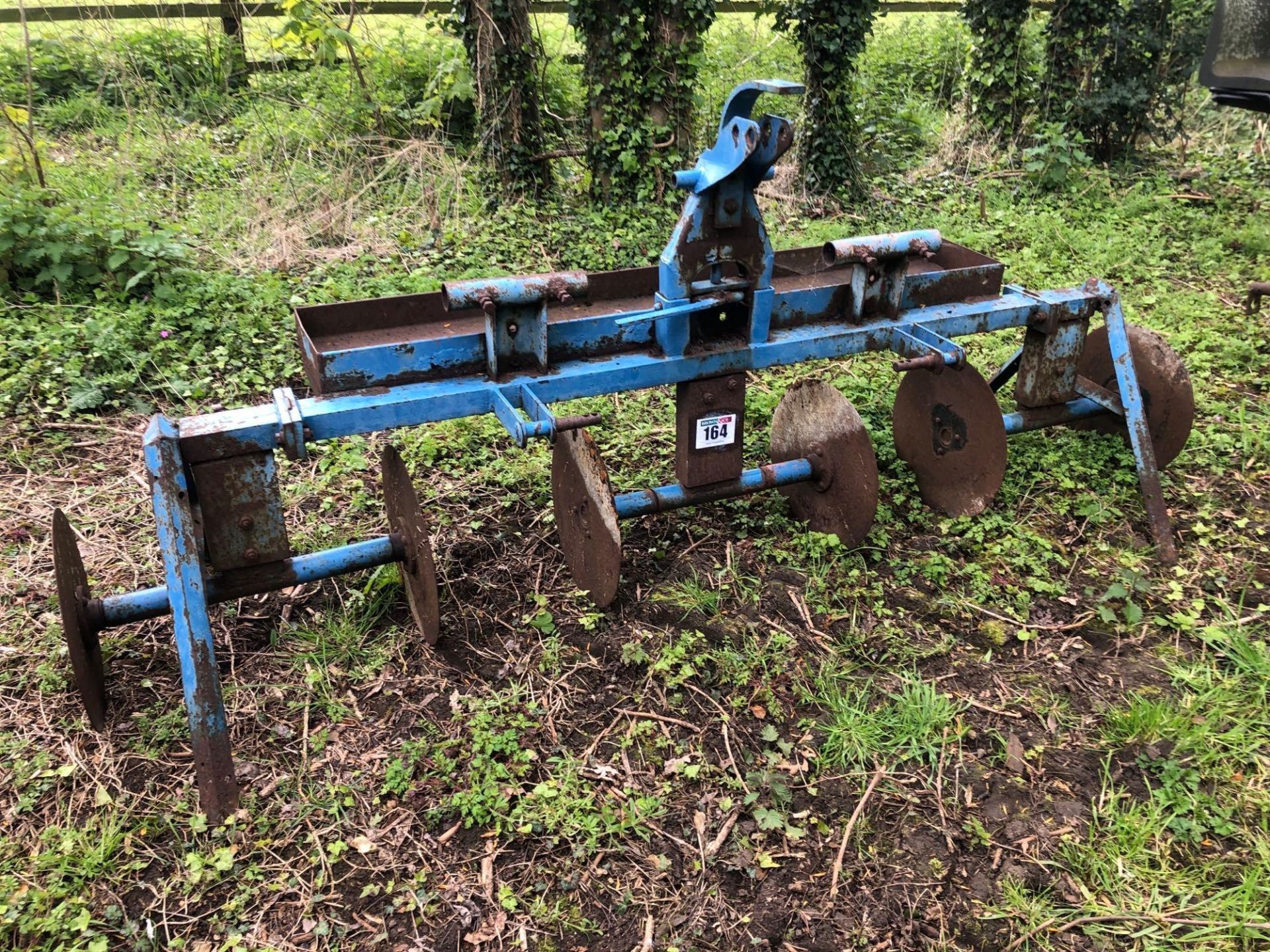 Farm-made discs for strawberry runs, linkage mounted