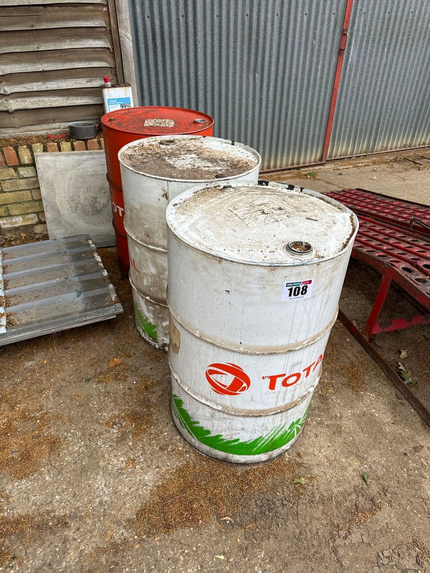 3No used oil barrels