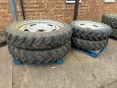 Set Alliance 13.6R48 rear and BKT 11.2R36 front row crop wheels and tyres on Massey Ferguson centres