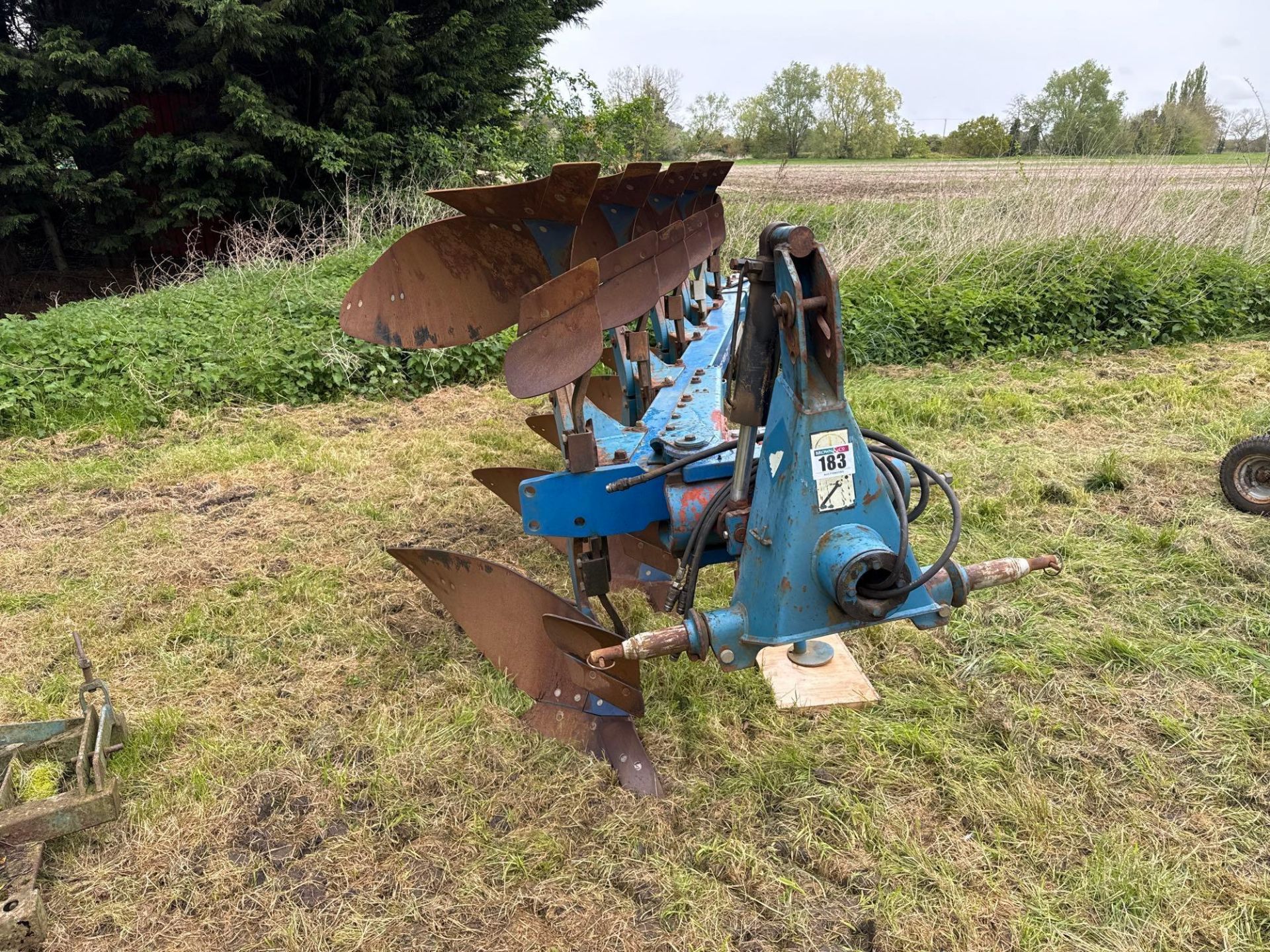 Overum CX590F 5f reversible plough with skimmers, hydraulic vari-width. Serial No: 96 264201