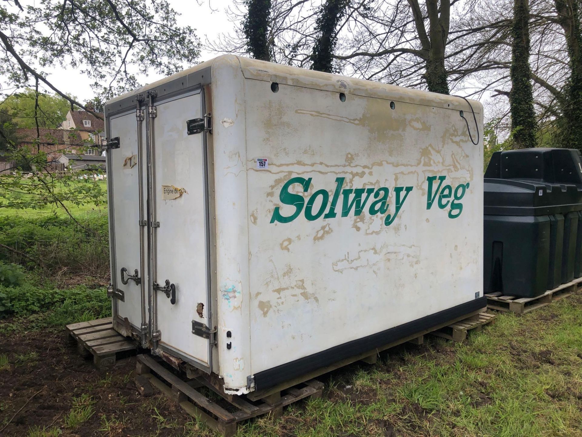 White container cabinet ex van body, has been used for oil storage, approx internal dimensions 3.1m