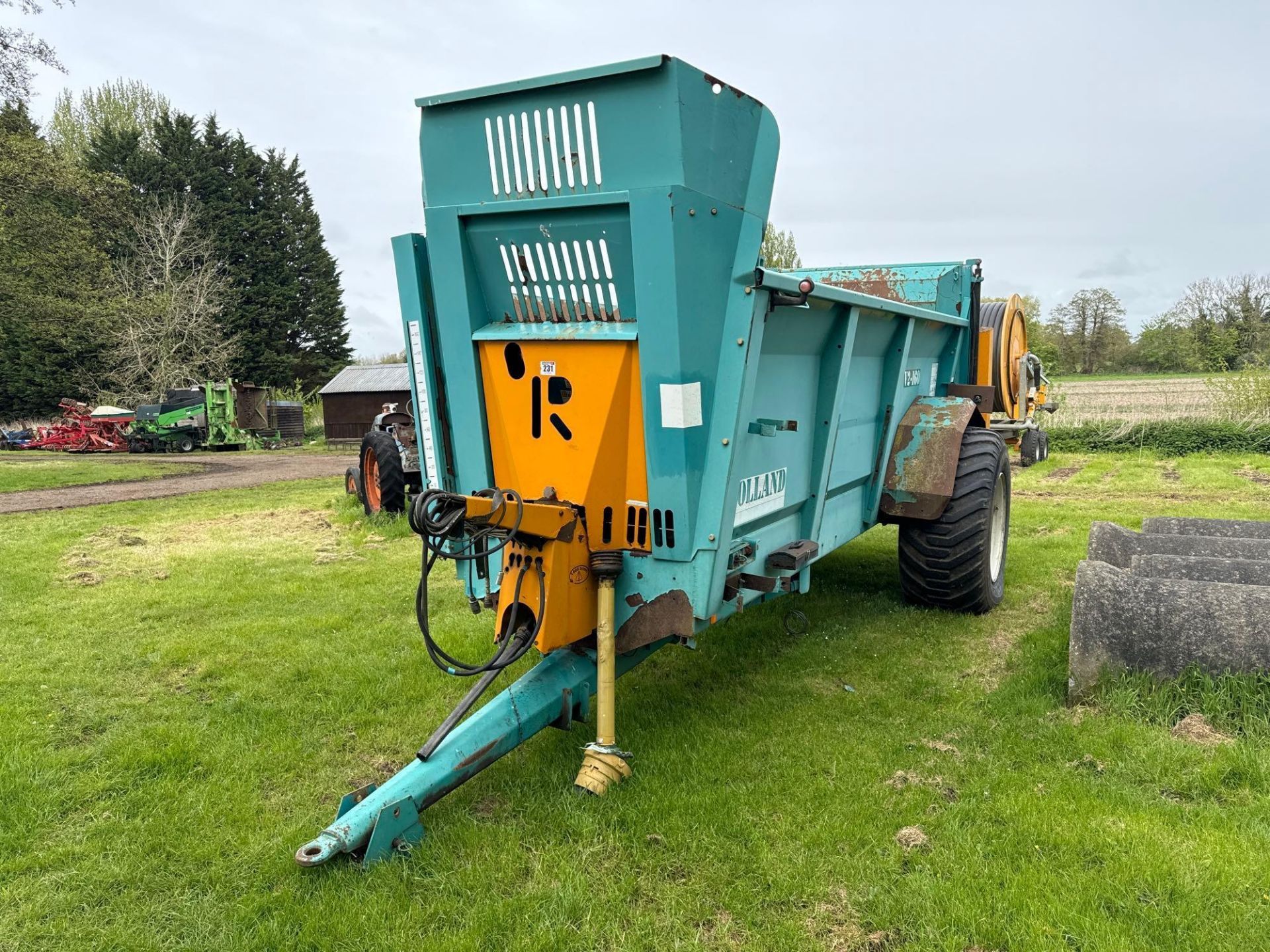 2007 Rolland V2-160 single axle rear discharge manure spreader with horizontal beaters, slurry door