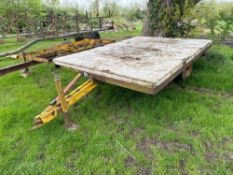 Farm-made Root Engineering flat bed trailer with wooden floor on 10.0/75-15.3 wheels and tyres