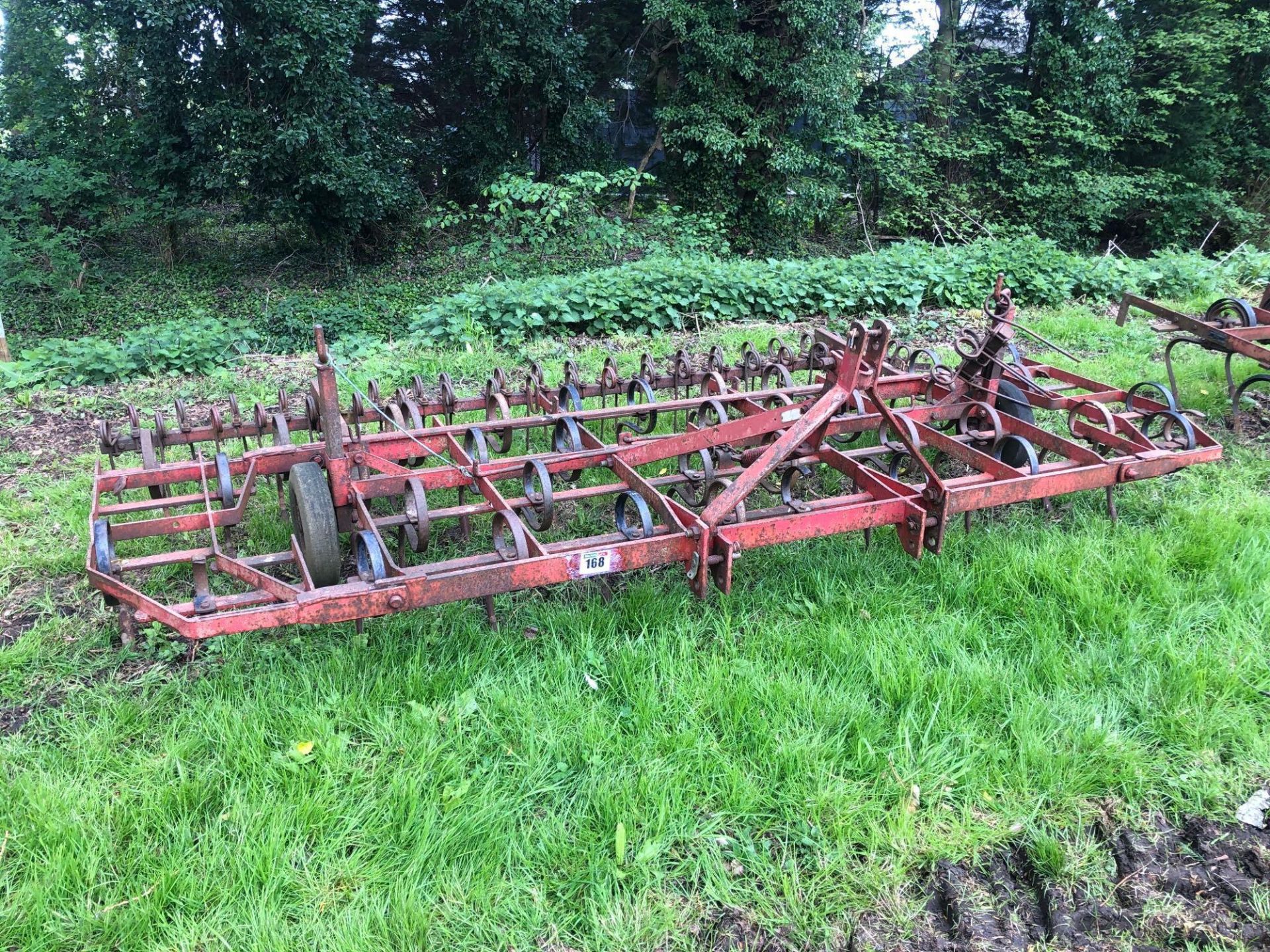 Kongskilde 12ft manual folding springtine cultivator with rear levelling tines, linkage mounted. Ser