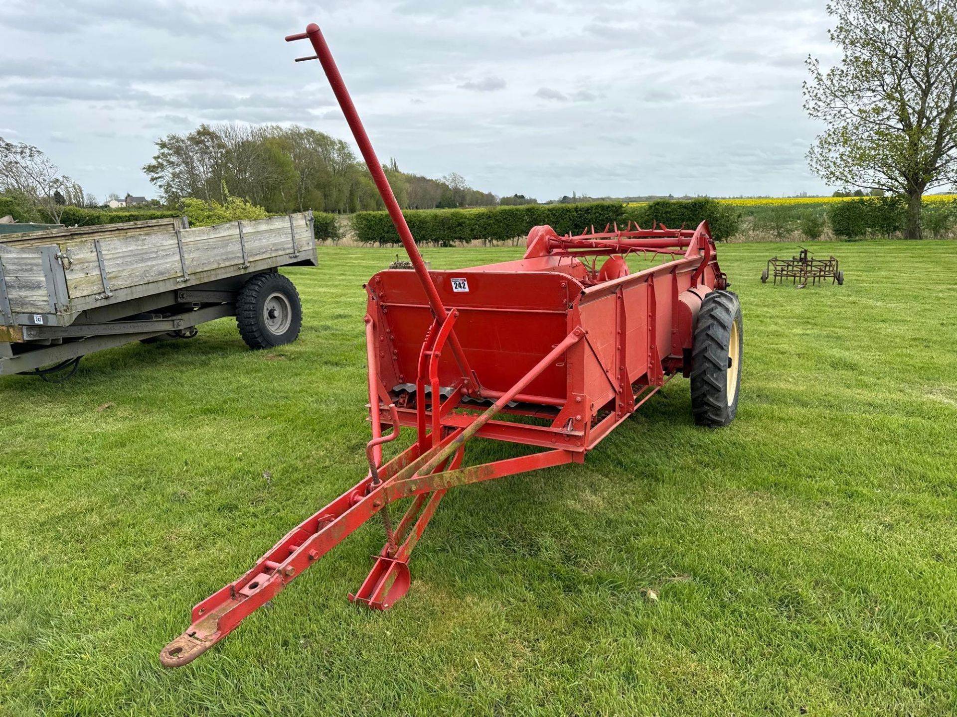 Massey Ferguson 712 rear discharge manure spreader single axle on 7.50-20 wheels and tyres. Serial N