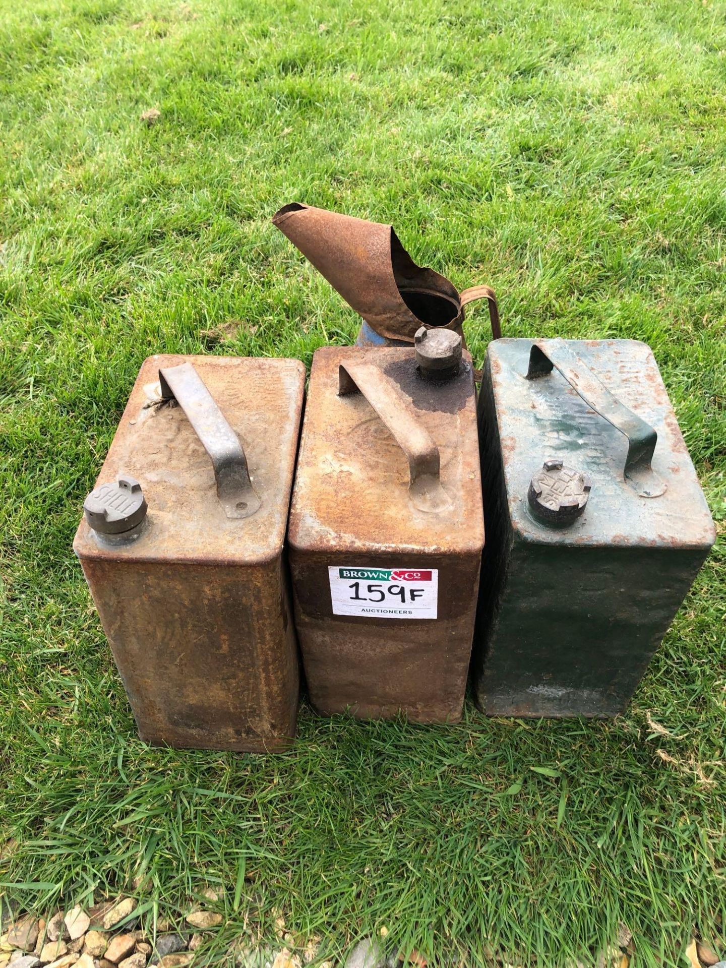3No vintage petrol cans and jug. NB: Caps in office
