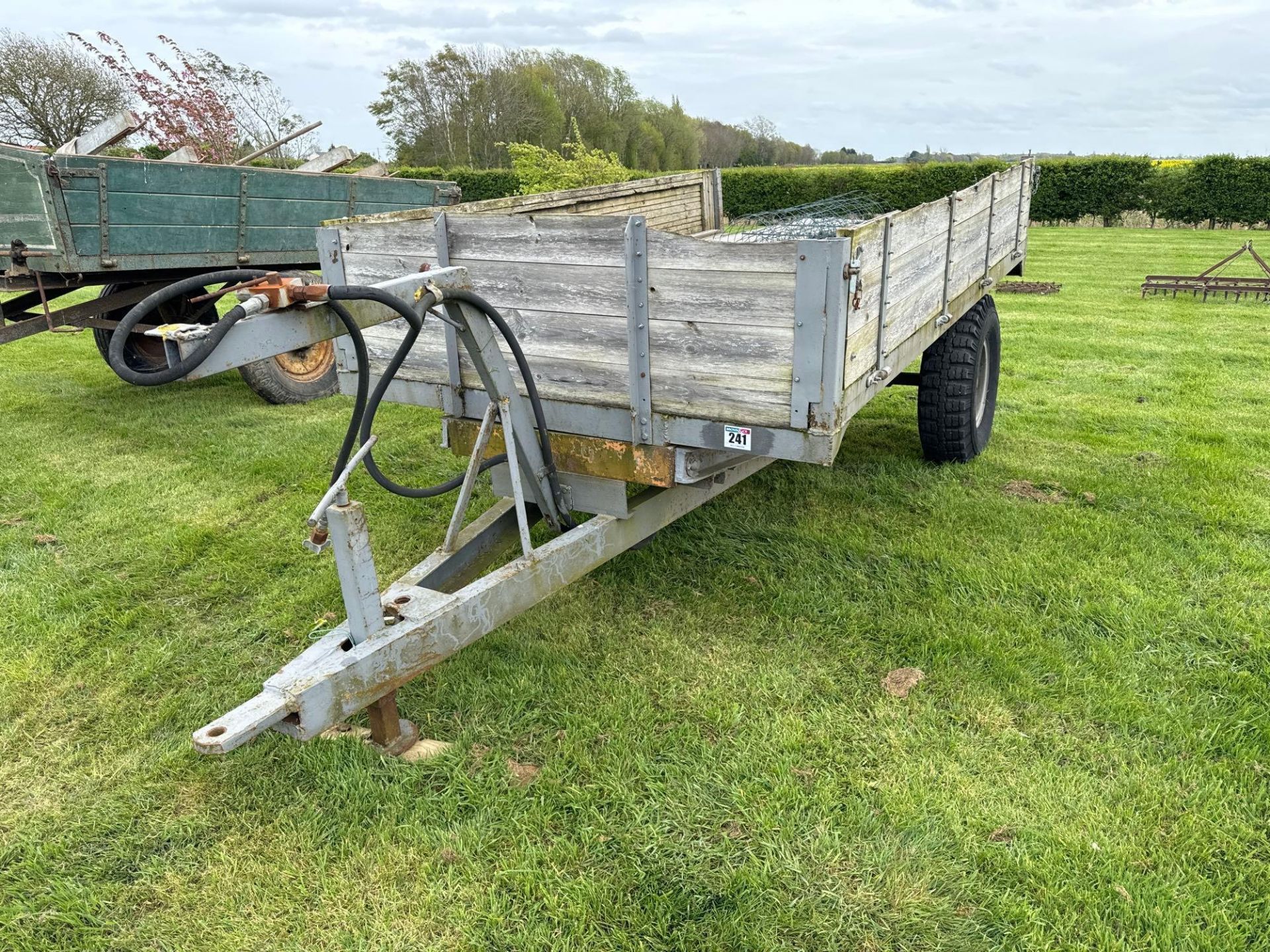 Wooden dropside 3t high tip hydraulic tipping single axle trailer on 9.00-16 wheels and tyres