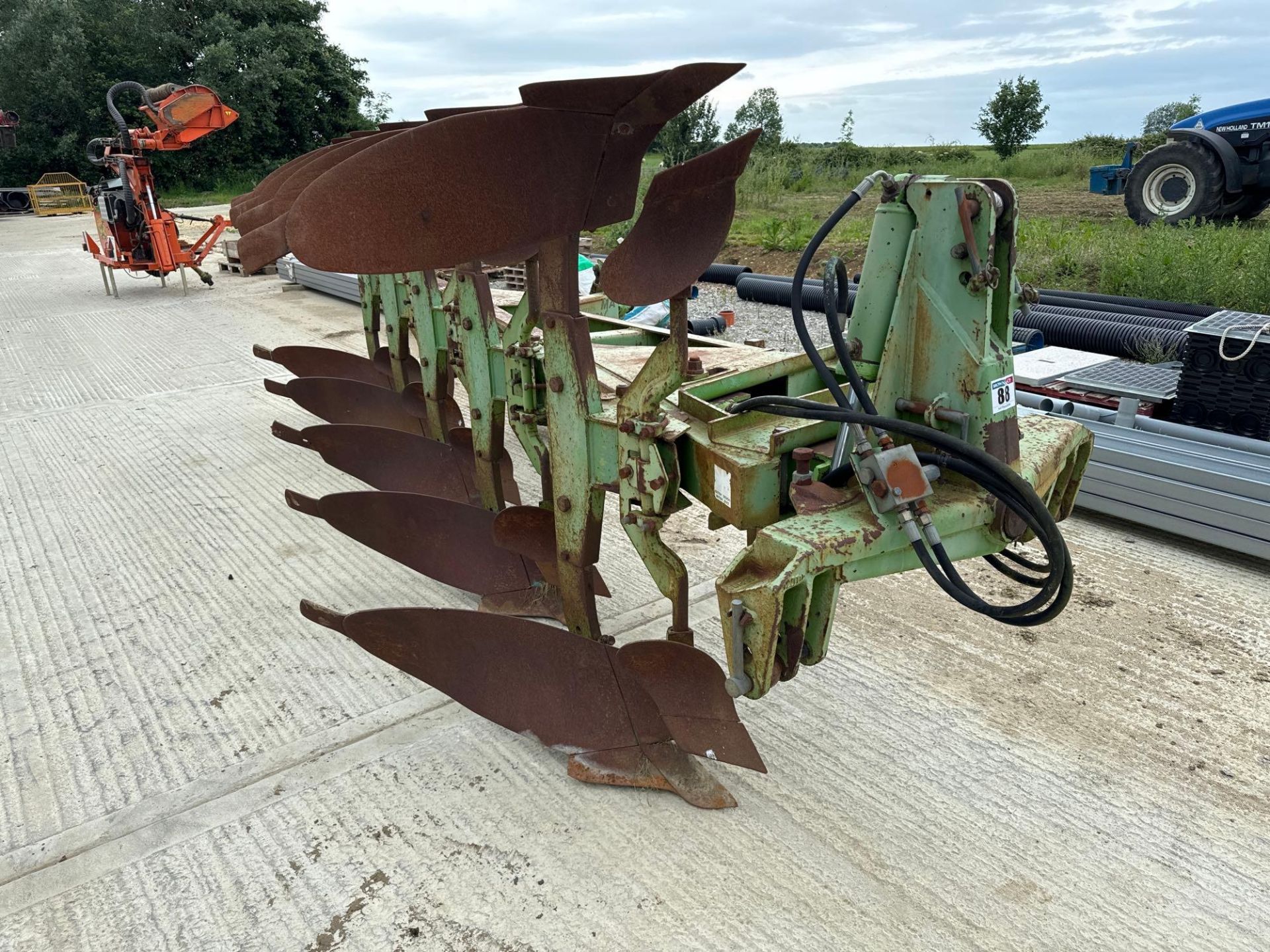 1993 Dowdeswell DP120S 5 furrow (4+1) reversible plough with rear discs and hydraulic vari-width. Se