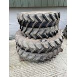 Set 340/85R48 rear and 320/90R 32 front wheels and tyres to suit New Holland