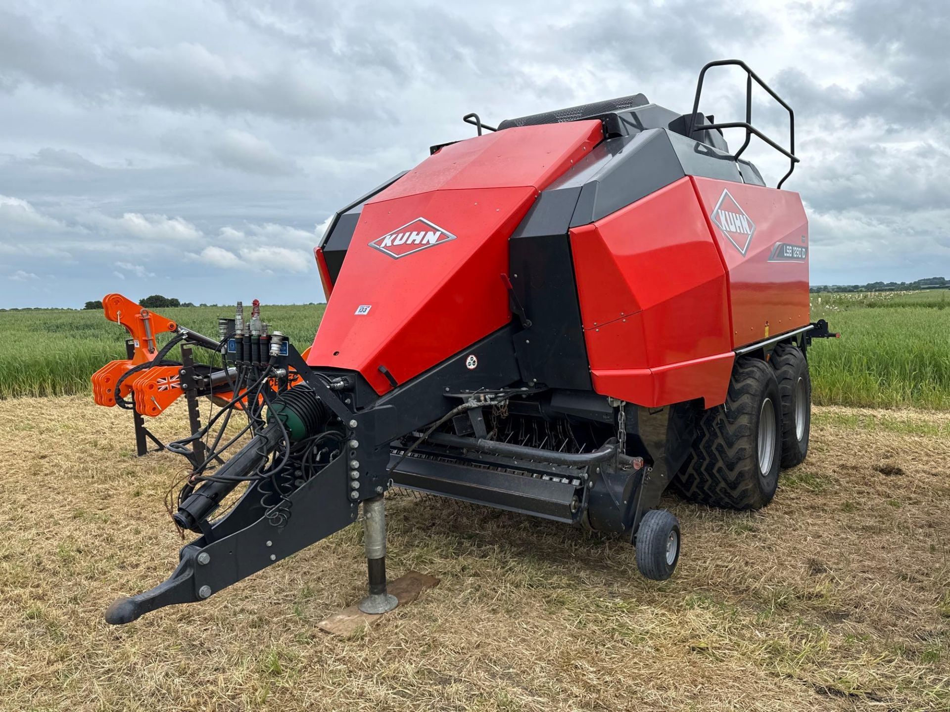 2019 Kuhn LSB1290iD twin axle square baler with Optifeed hardox rotor, slip clutch flywheel, powered