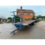 Philip Watkins 32ft twin axle flat bed trailer with metal floor, front bale rave, sprung drawbar and