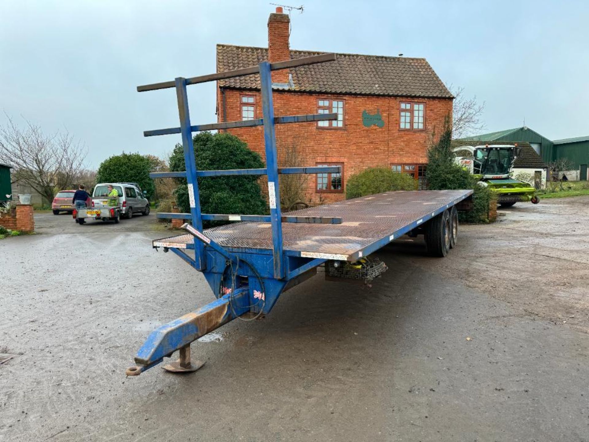 Philip Watkins 32ft twin axle flat bed trailer with metal floor, front bale rave, sprung drawbar and
