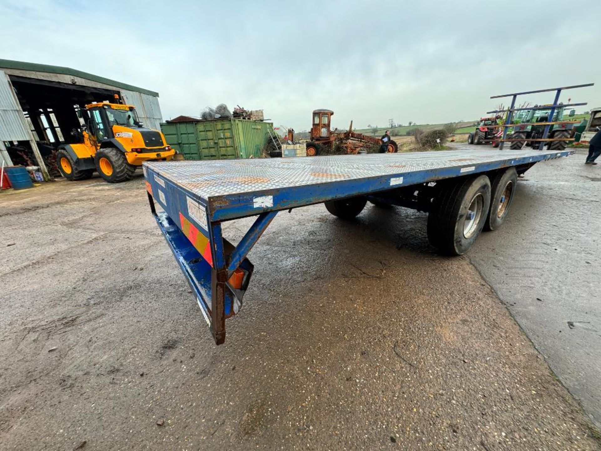 Philip Watkins 32ft twin axle flat bed trailer with metal floor, front bale rave, sprung drawbar and - Image 4 of 11