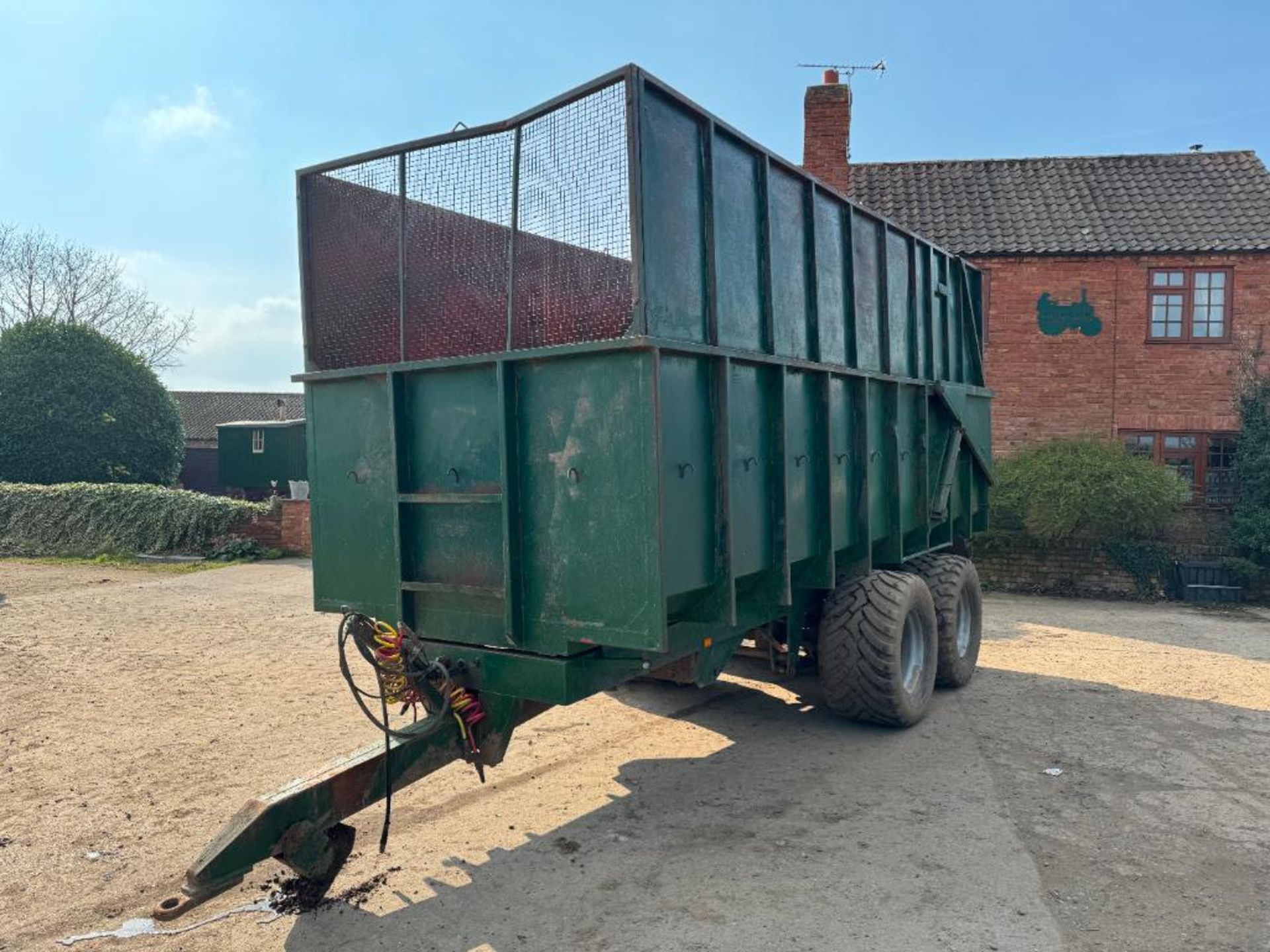 Twin axle 16t grain tailer with sprung drawbar, air brakes, hydraulic tailgate, grain chute and sila