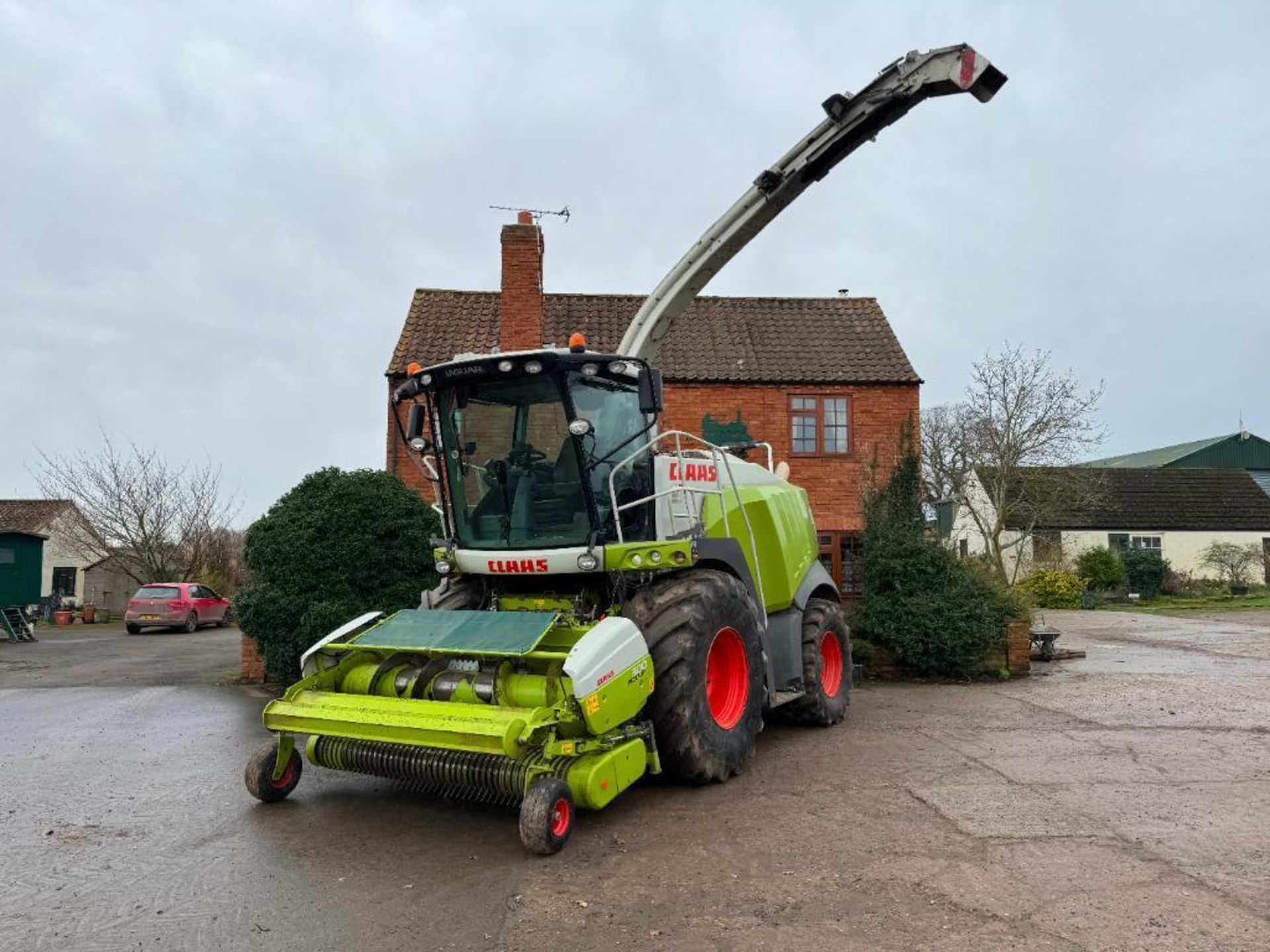 2014 Claas Jaguar 970 self-propelled forage harvester with rock stop, metal detector, rear and spout