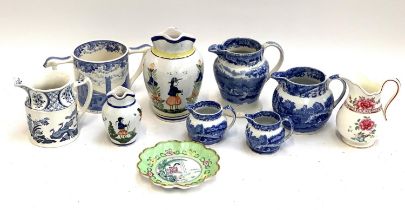 A mixed box of ceramics to include Spode blue and white, Quimper jugs, the tallest 20.5cmH, crescent