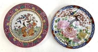 A Chinese famille rose plate, 26.5cmD; together with one other Chinese style plate