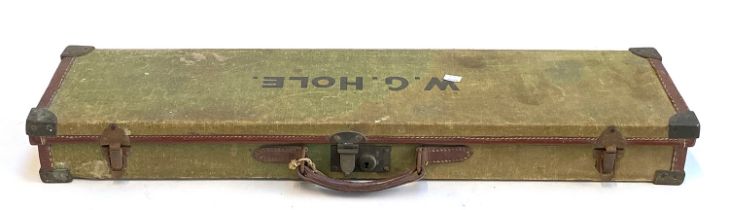 A green early 20th century canvas gun case, bears label C.B Vaughan, 39 Strand London, 84cmW;