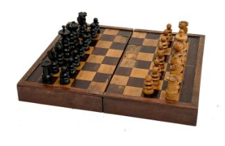 A folding chess/backgammon board, with large chess pieces, the board 44x38cm; together with a