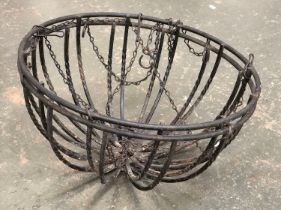 A pair of wrought metal hanging planter baskets, each 46cmD