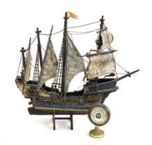 A model galleon, 56cmL; together with a barometer