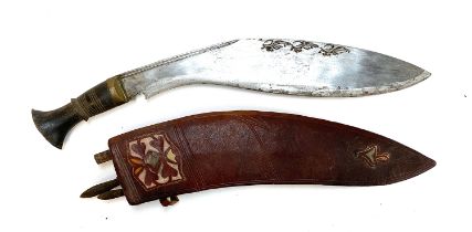 A large kukri knife, in leather sheath, 43cm long overall