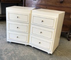 A pair of white painted bedside cabinets, each with three drawers, 40.5x34x63cmH