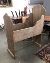 An oak cradle, commissioned by Harrods, built using c.14th century reclaimed oak planks from Hampton