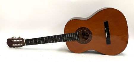 A Stag model C542 classical guitar in Stentor soft case; together with a student classical guitar in