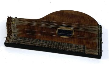 A 19th century German zither, bearing label for Ignaz Siman of Haidhausen, 48cmL
