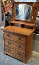 An early 20th century chest of three drawers, with adjustable mirror above, 84x51x84cmH