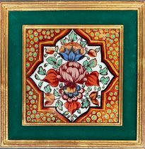 An Indian reverse painting on glass, flowers with a quatrefoil, 17x17cm