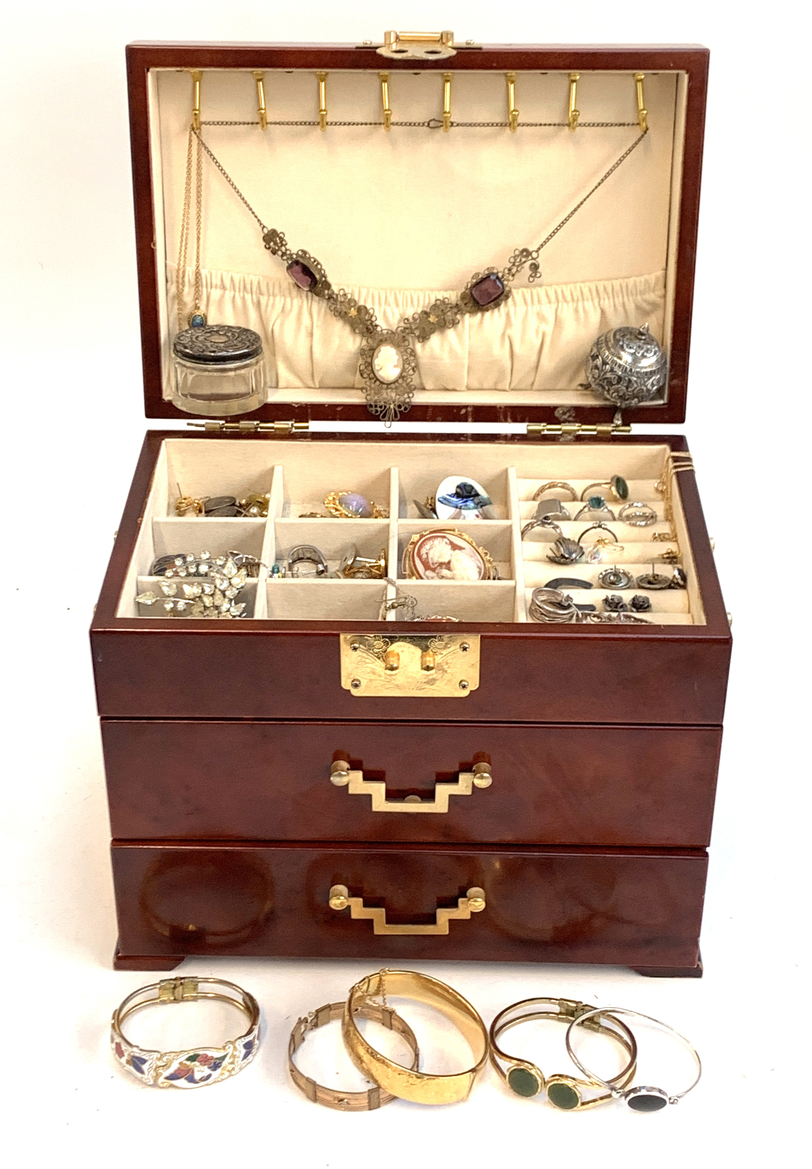 A jewellery box containing a quantity of costume and silvery jewellery, including a Czech Gurtler