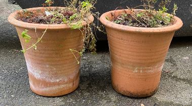 A pair of terracotta plant pots, 32cmH