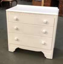 A white painted chest of three drawers, 76cmW