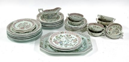 An Adams Calyx ware part dinner service, comprising twin handled cups, plates, side plates etc