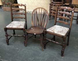 A 19th century ash and elm Windsor chair; together with two modern ladderback chairs