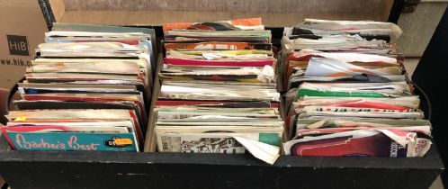 A large box of miscellaneous 45s featuring a wide variety of genres, labels, and distributors.