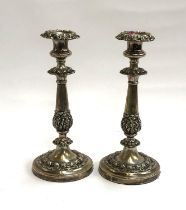 A pair of silver plated candlesticks, each with removable nozzles, 28cm high