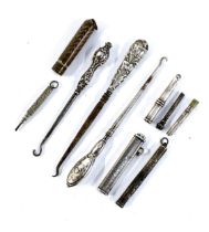 A mixed lot to include silver handled button hooks, various propelling pencil parts etc