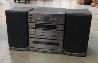 A Pioneer hi-fi stack, together with speakers
