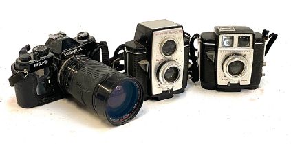A Yashika FX-3; a Kodak Brownie Reflex 20 and a Brownie Twin 20