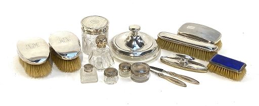 A large mixed lot of silver and silver topped dressing table items, to include a cotton wool jar; as