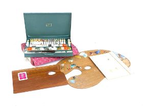 A vintage Winsor & Newton artists paint box and palette, in original box; together with a further